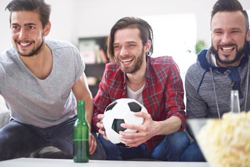 friends-watching-sports-game-together-at-house