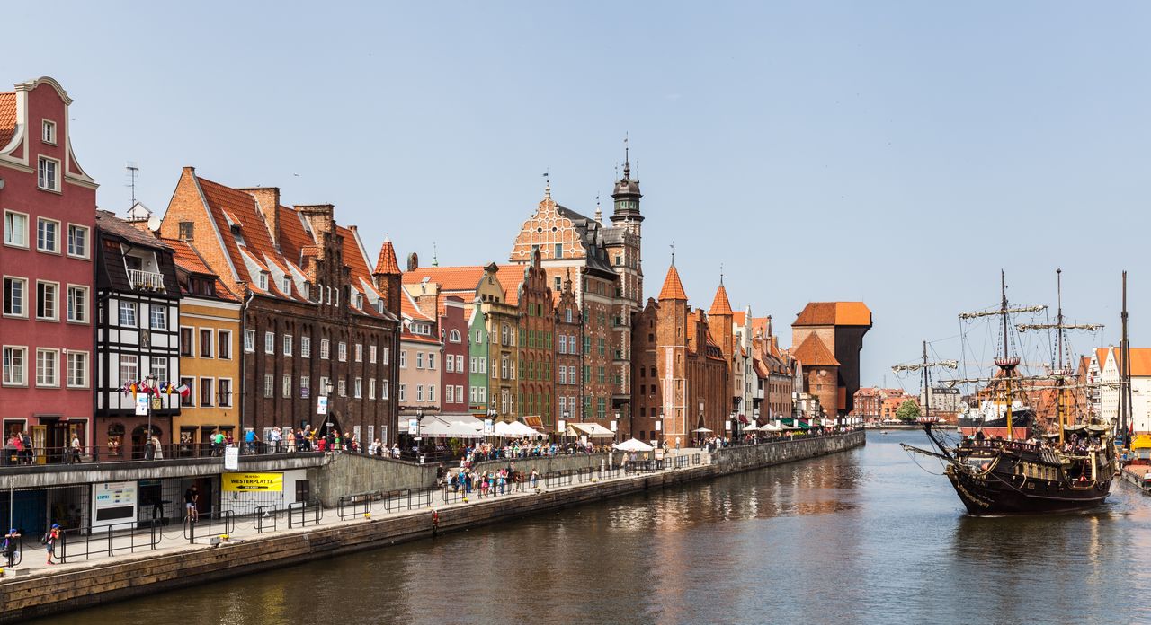 canal-in-Poland-with-ship-and-buildings-alongside
