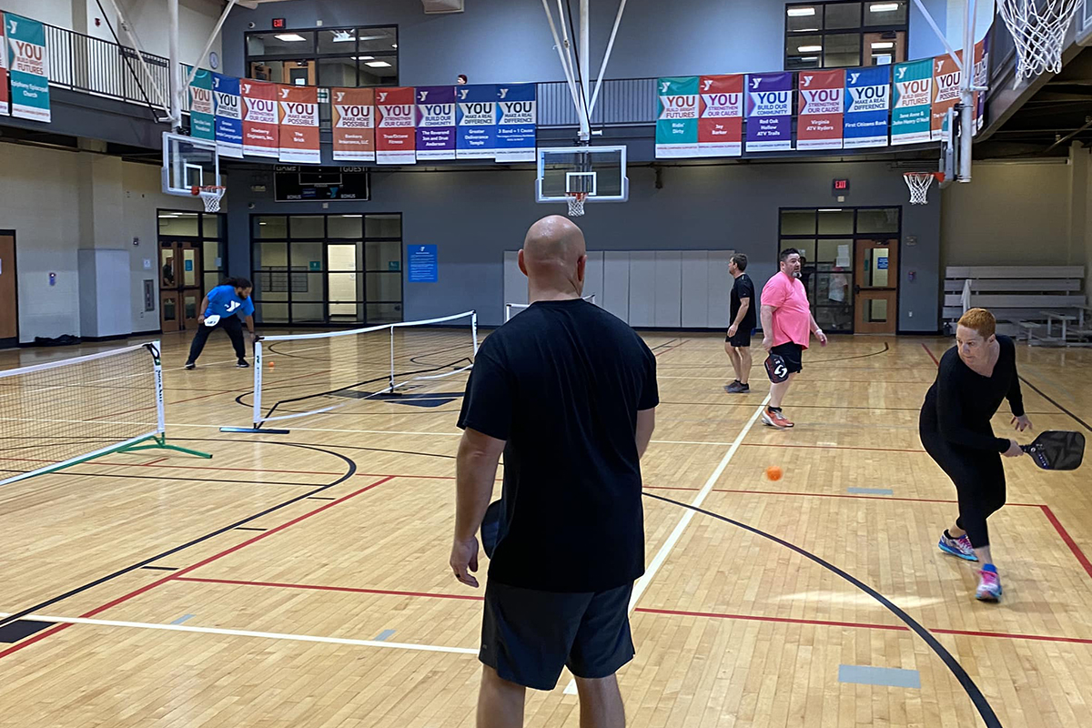 people-playing-pickleball-on-court